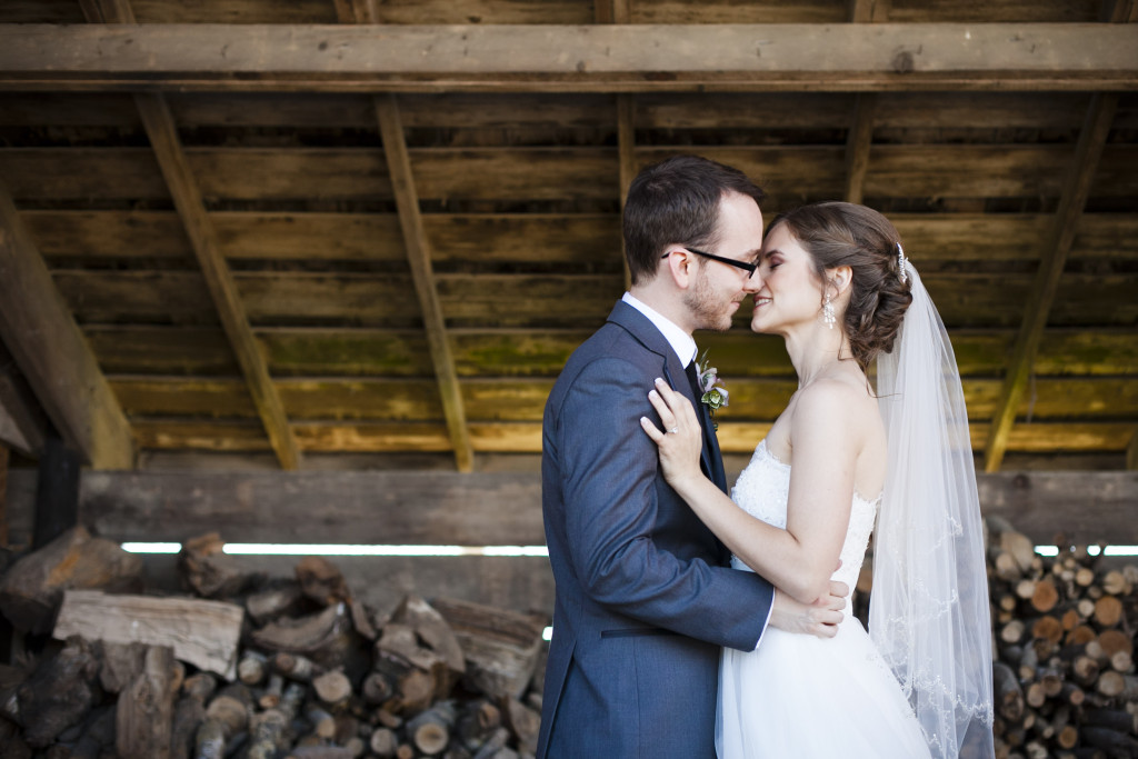 bride and groom barn portrait