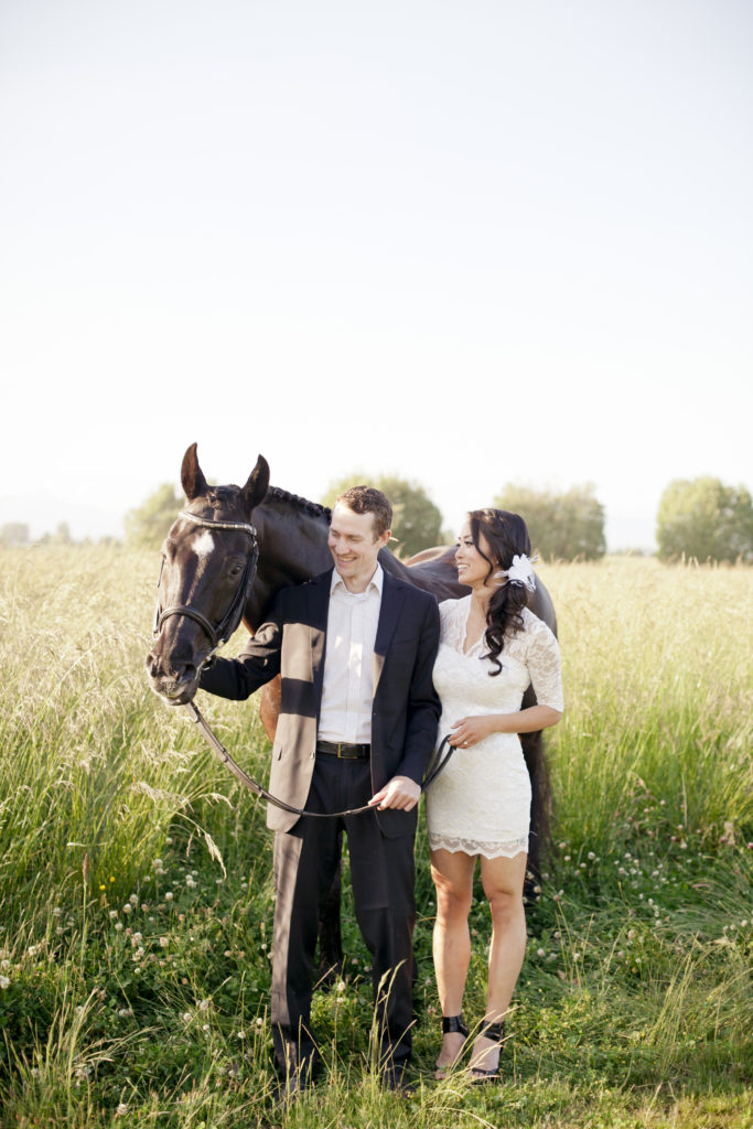 engagement photos couple in field with horse