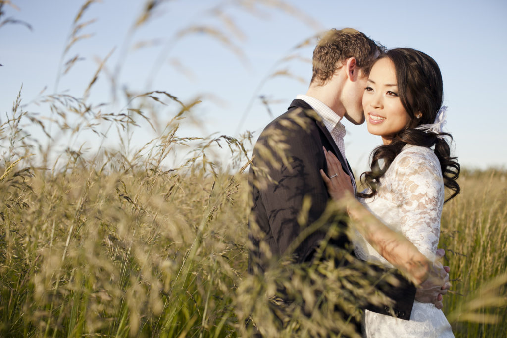 fraser valley engagement session in field of tall grass