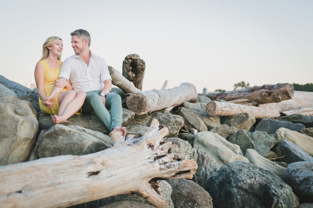 english bay engagement photos vancouver driftwood