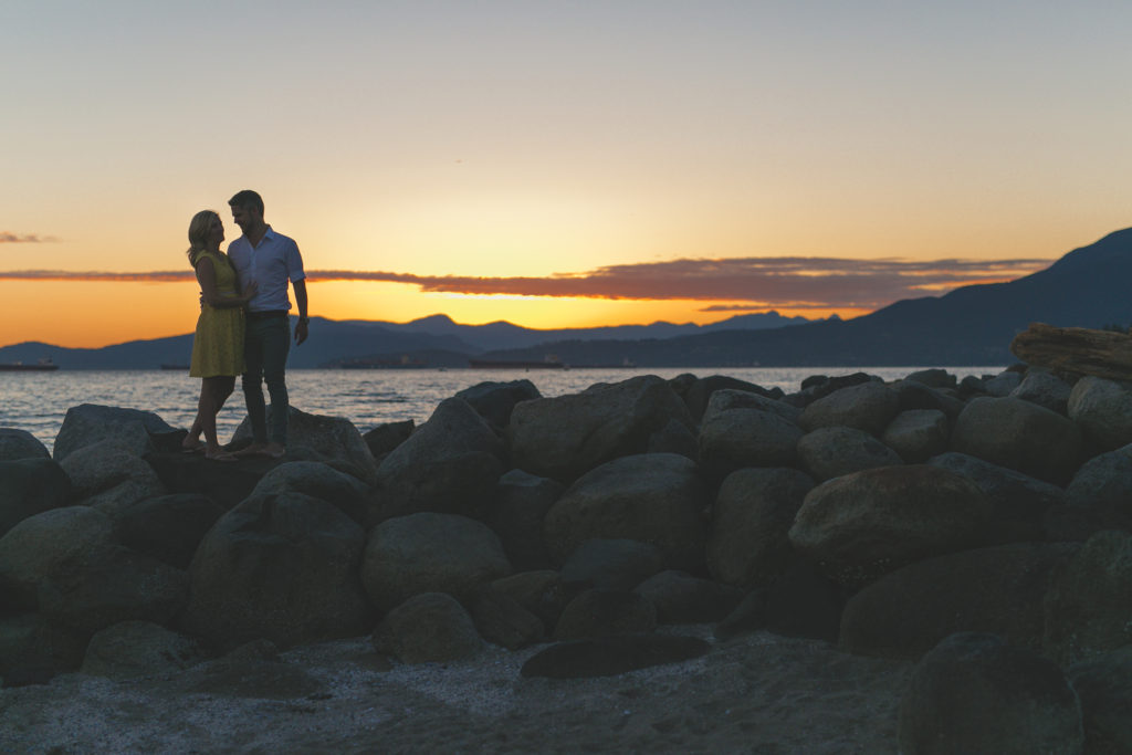 english bay engagement photos at sunset