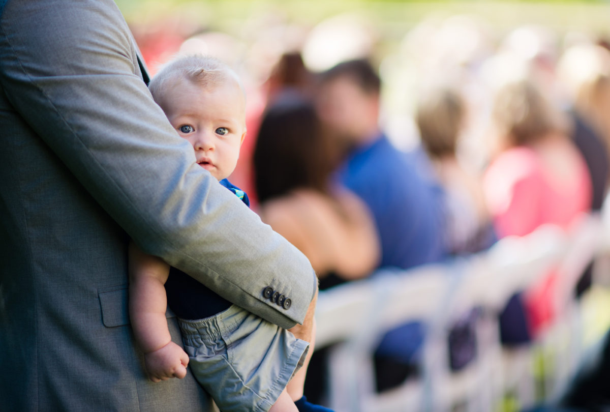 cute baby at wedding ceremony