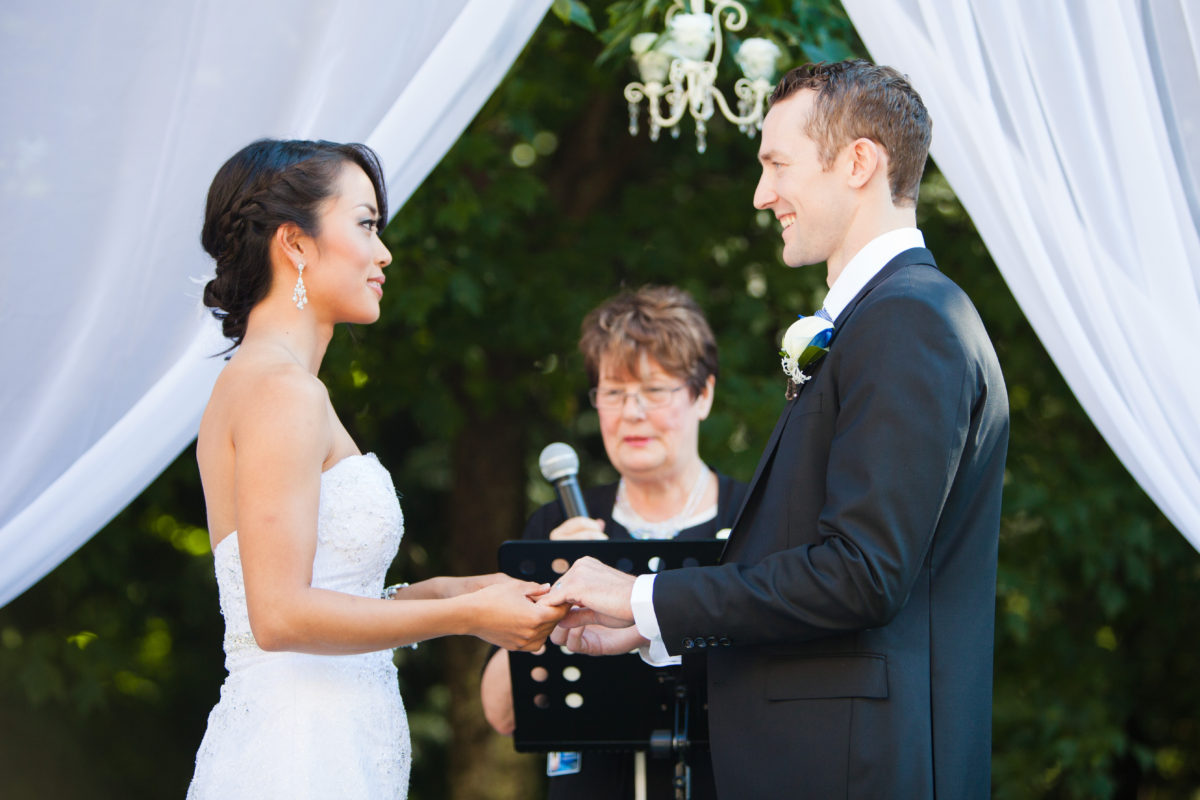 wedding ceremony port moody couple exchanging rings