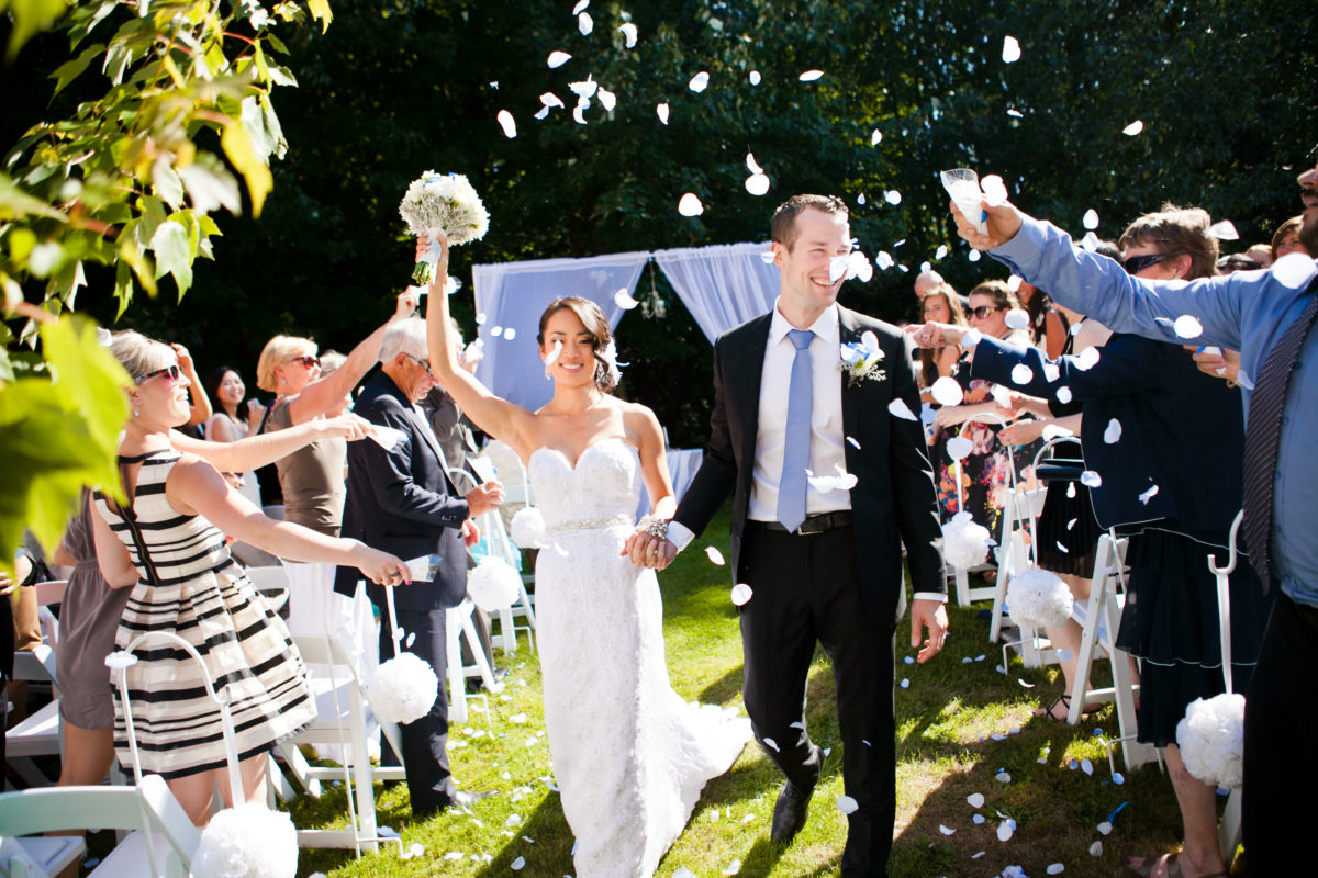 port moody inlet theatre wedding recessional with flower petals