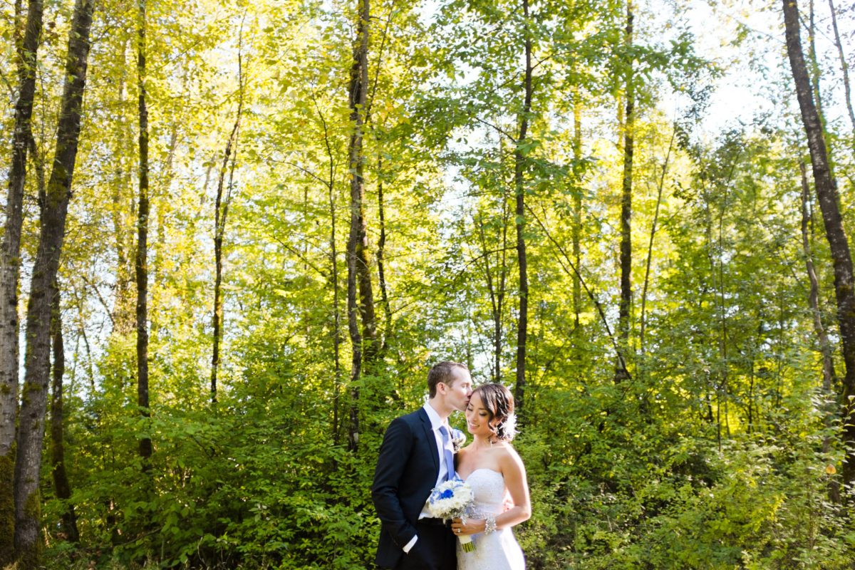 couple in forest port moody wedding