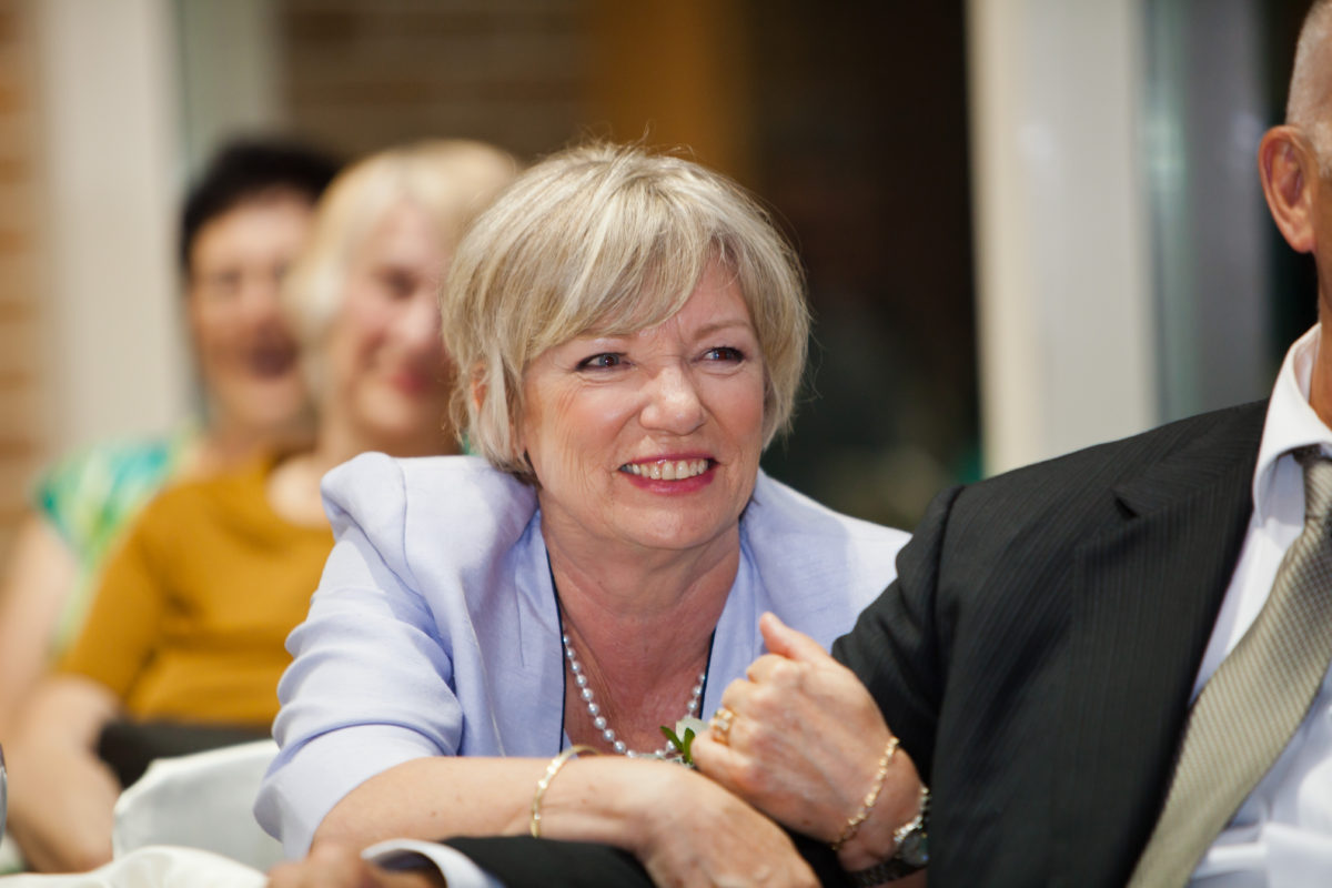 mother of the groom smiling at port moody reception