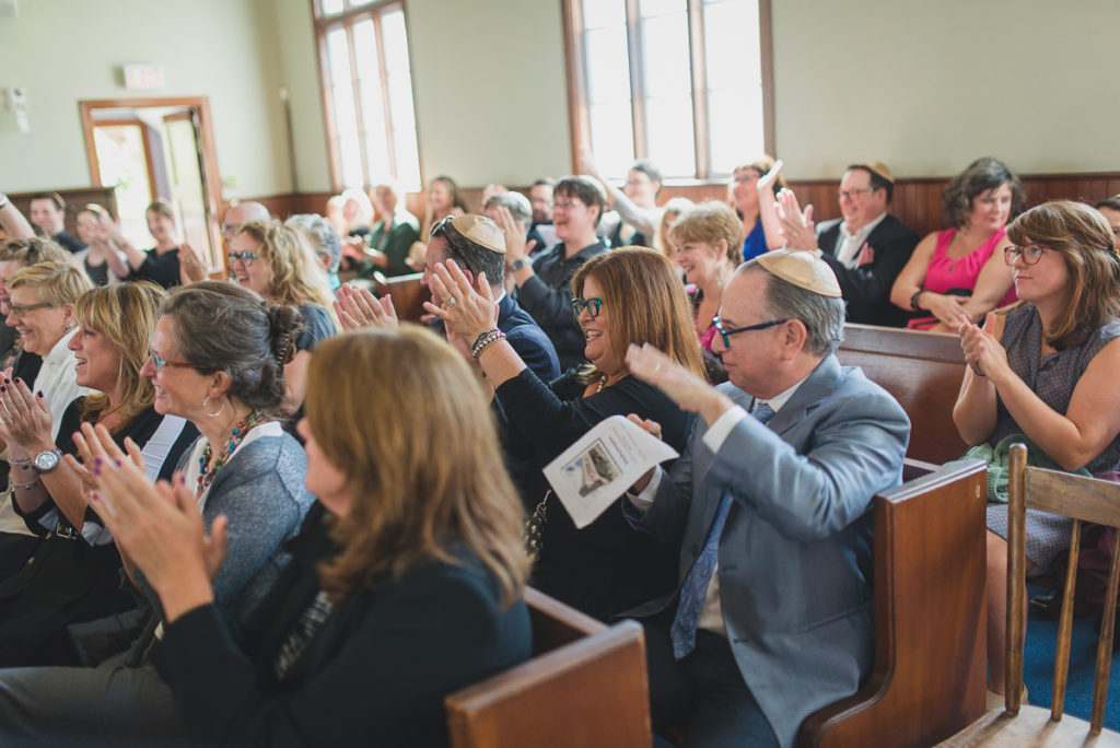 excited crowd at jewish wedding