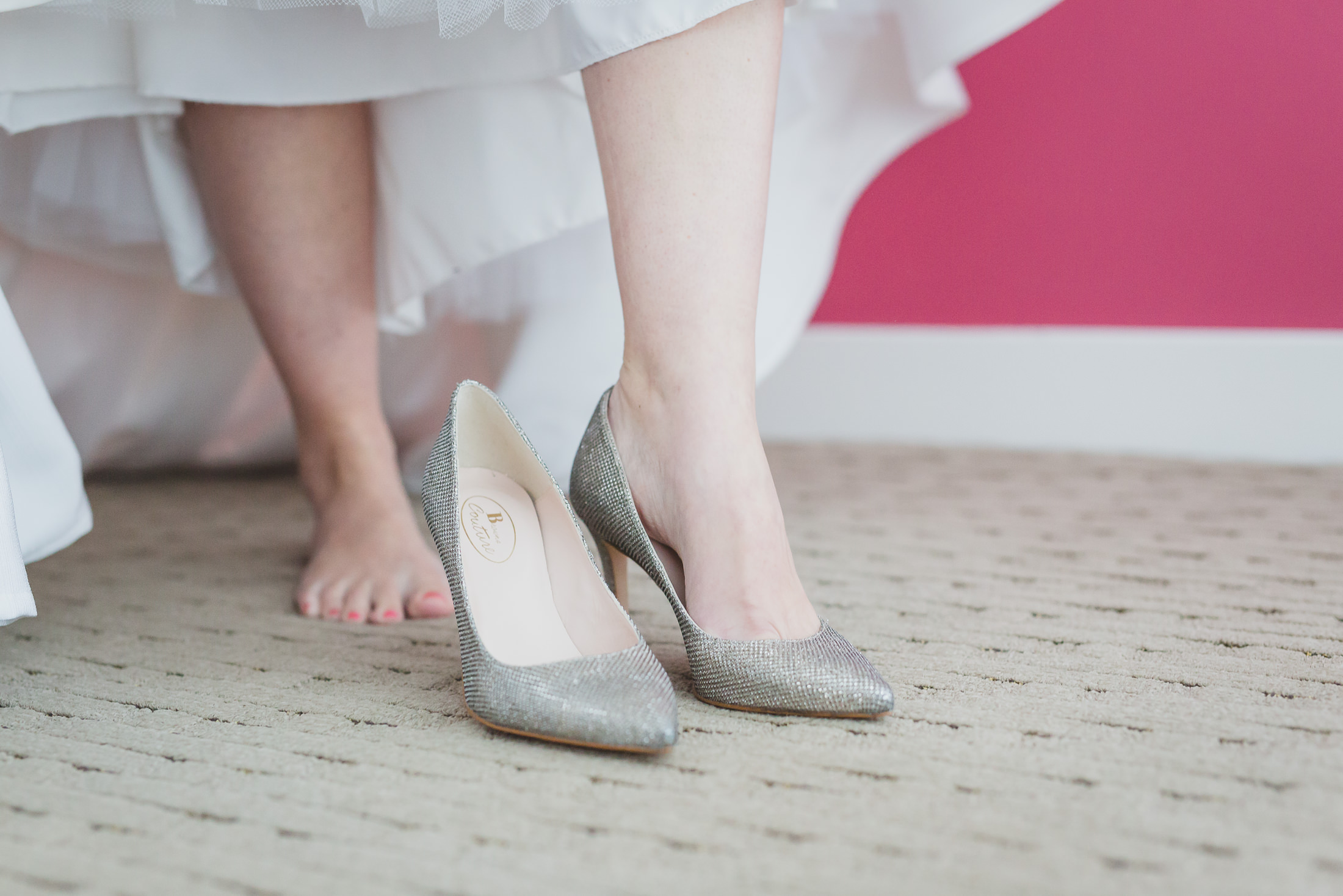 bride getting shoes on at opus hotel