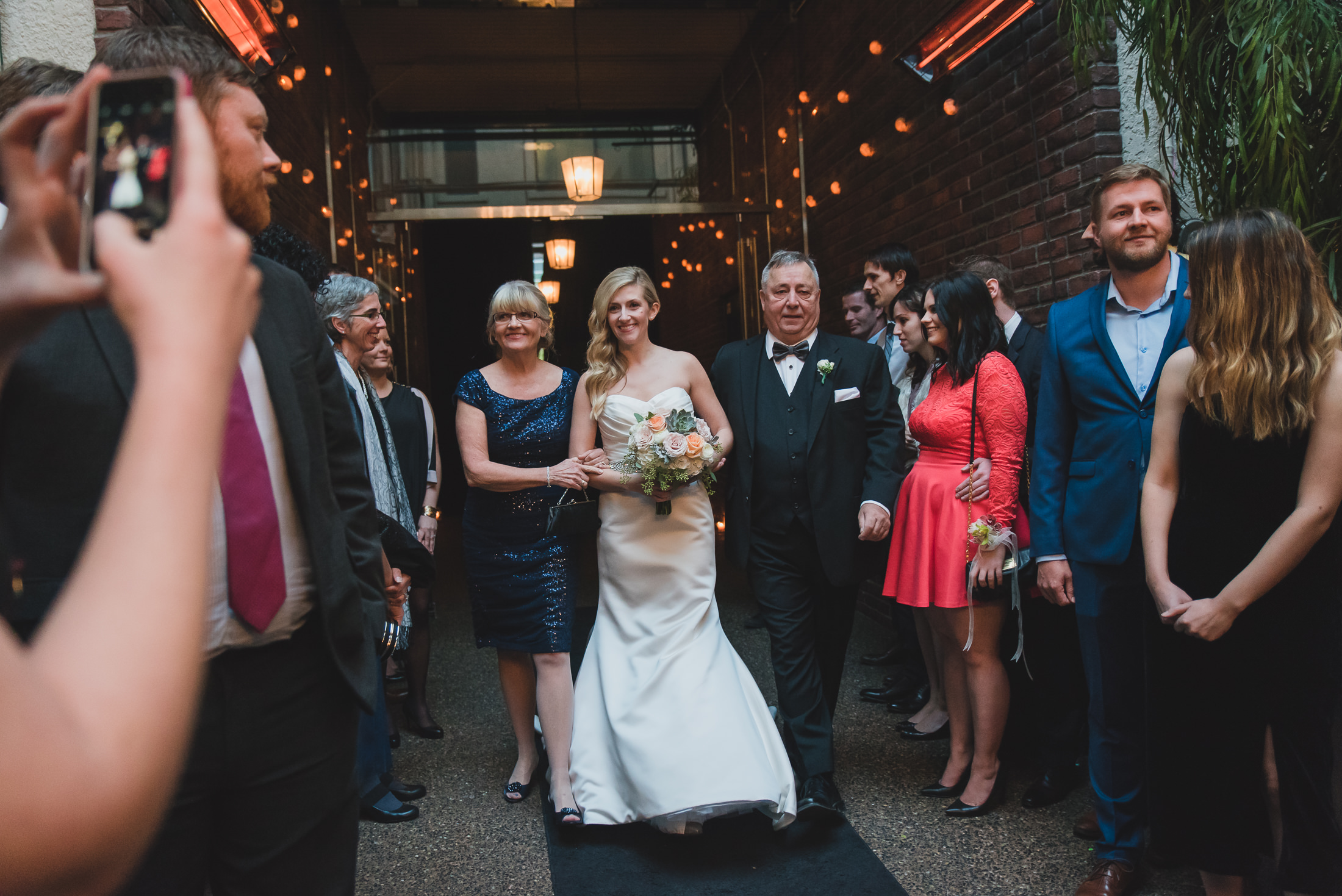 bride entrance with parents at wedding ceremony vancouver