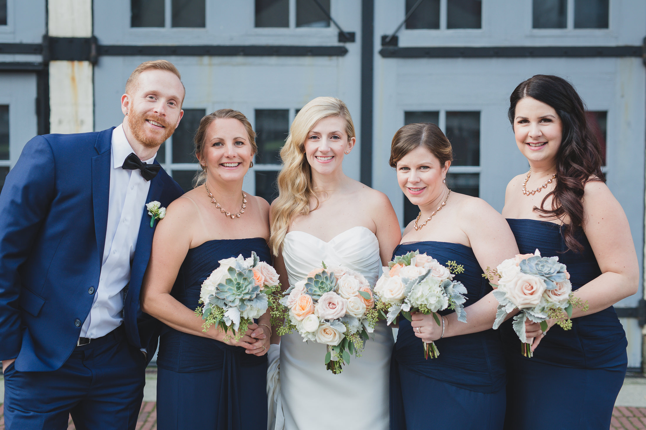 bride with bridesmaids and bridesman portrait