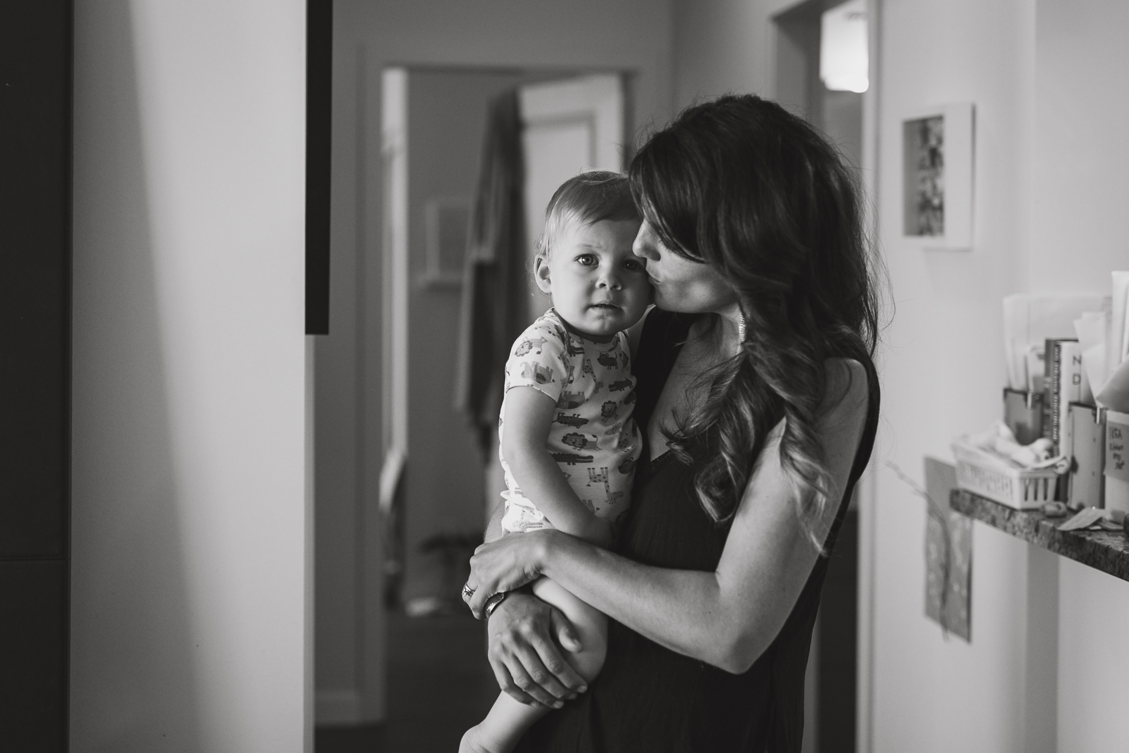 in home lifestyle family photography session with mom and toddler