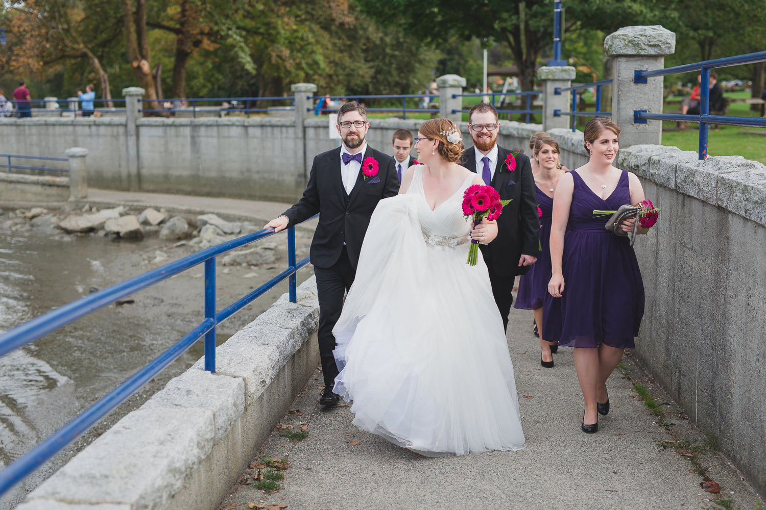 Casual wedding party candid in Rocky Point Park Port Moody