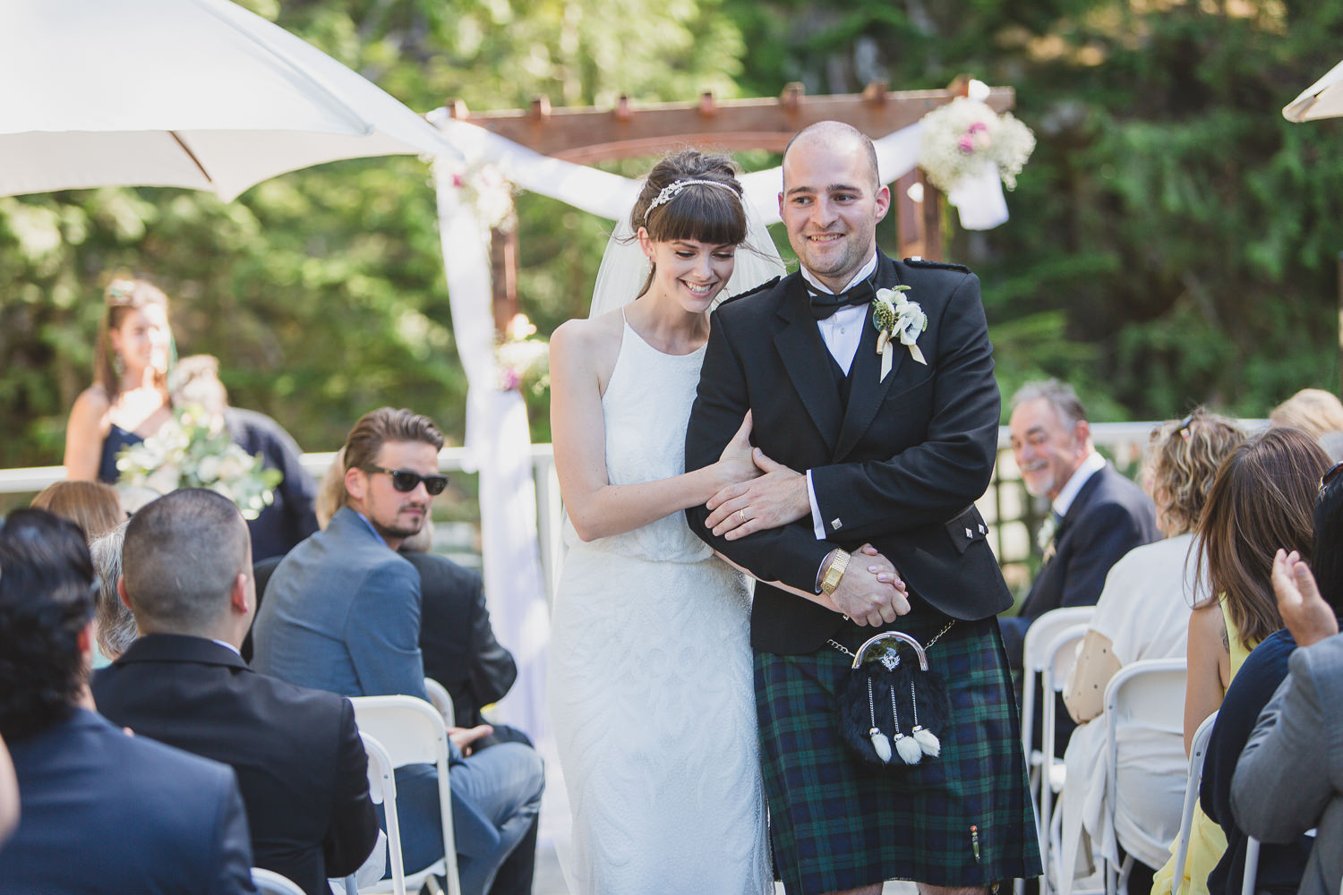 Wedding couple recessional with groom in kilt at Squamish wedding