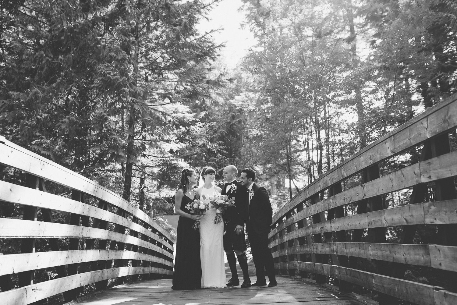 Wedding party on bridge at Furry Creek Gold & Country Club