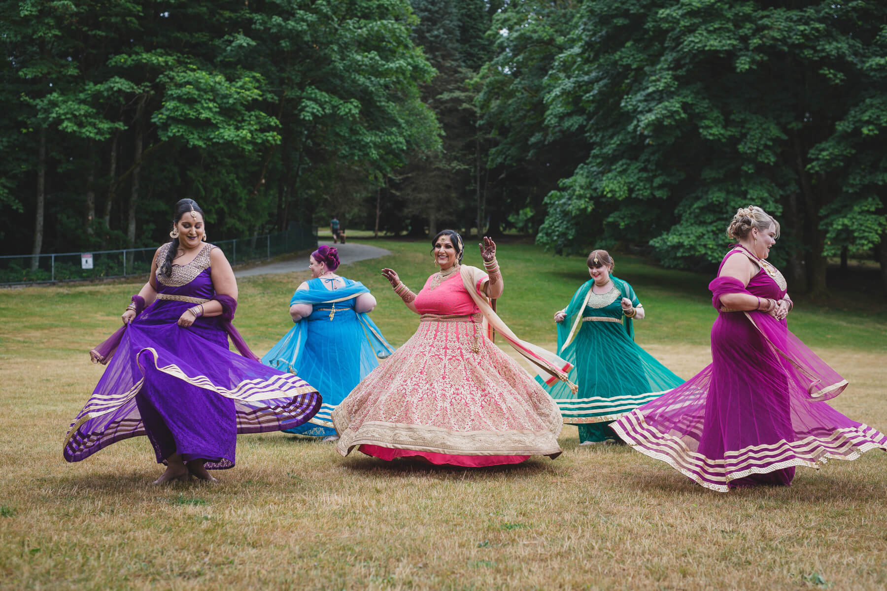 indian bridesmaids spinning portrait