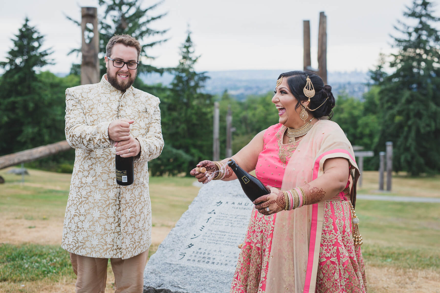 quirky bride and groom champagne pop at vancouver wedding