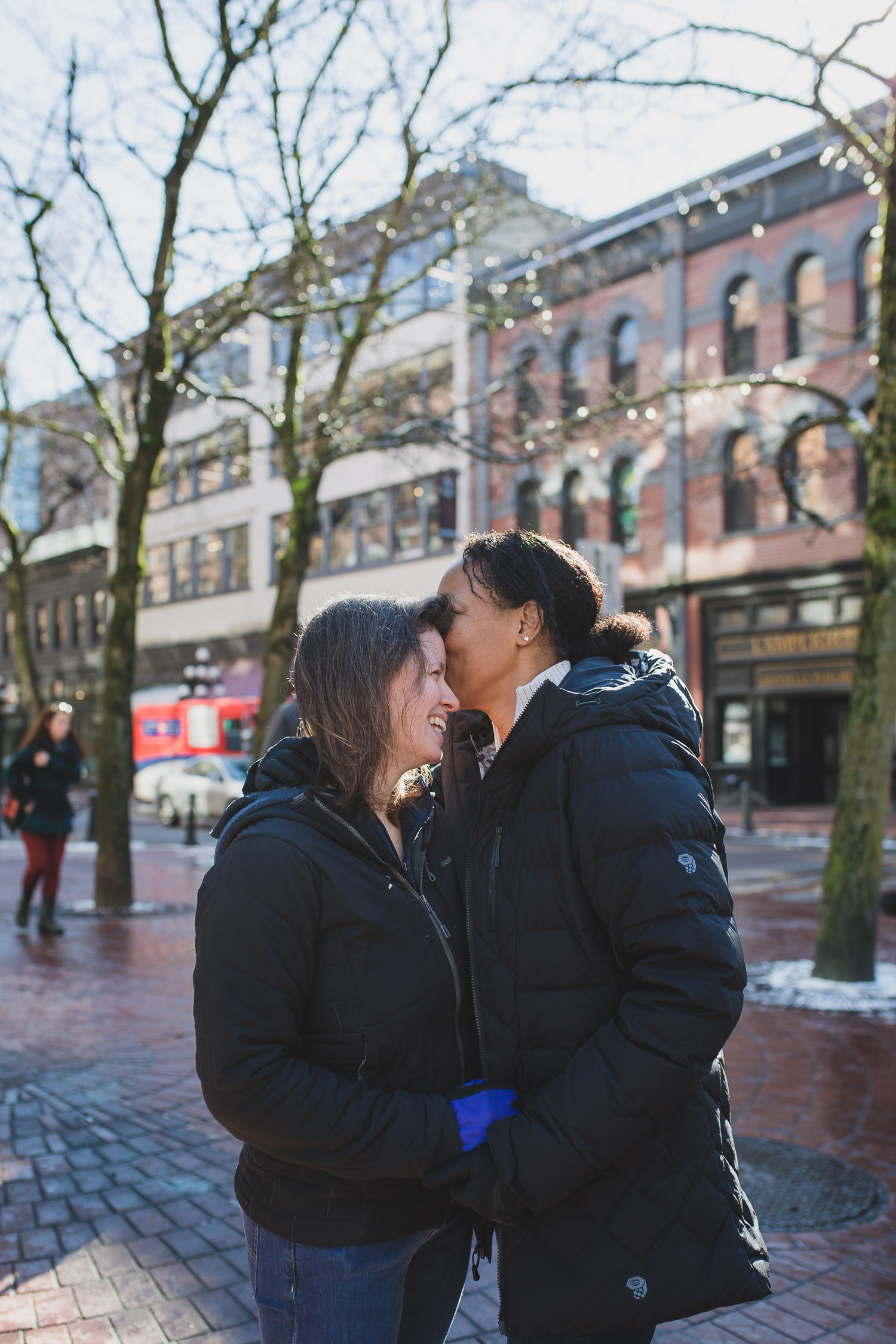 lgbtq couple on gastown street in vancouver