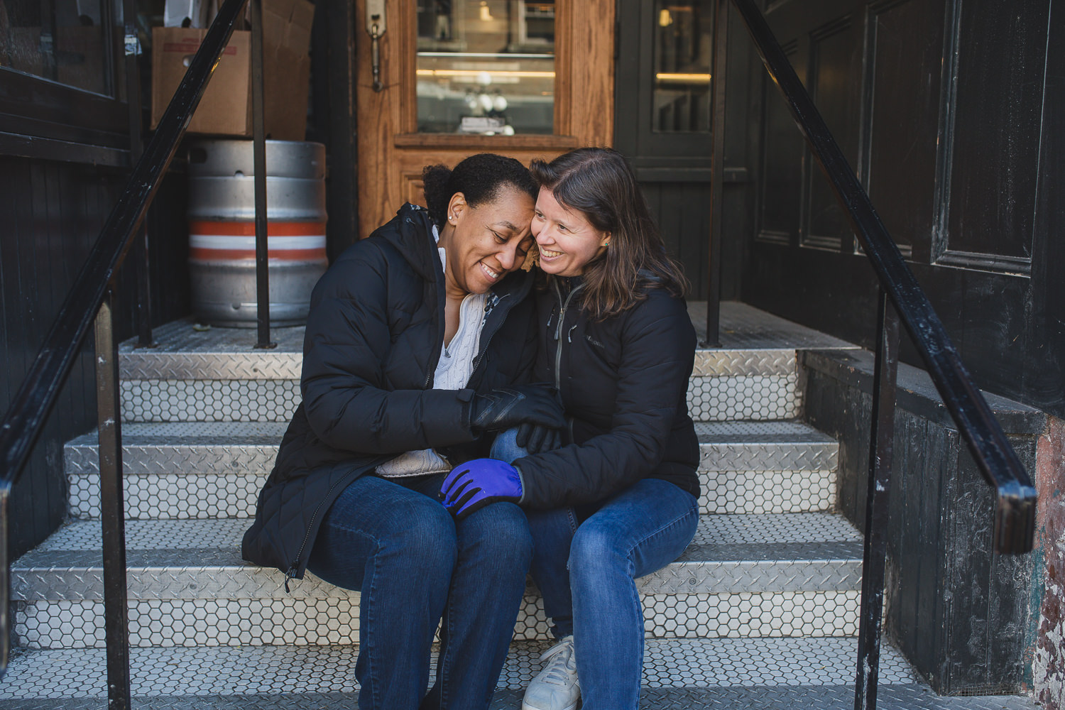 lgbtq couple on steps in gastown