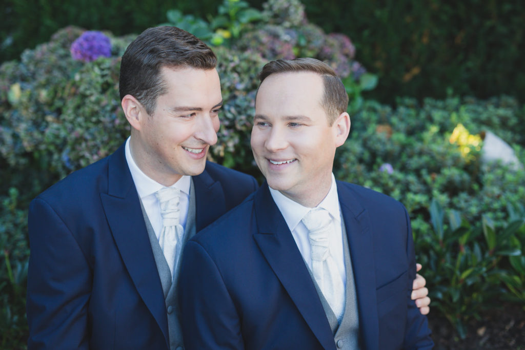 gay wedding photographer vancouver groom and groom portrait at Telus Garden