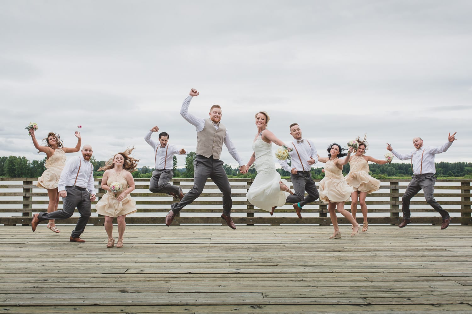 wedding party jumping portrait