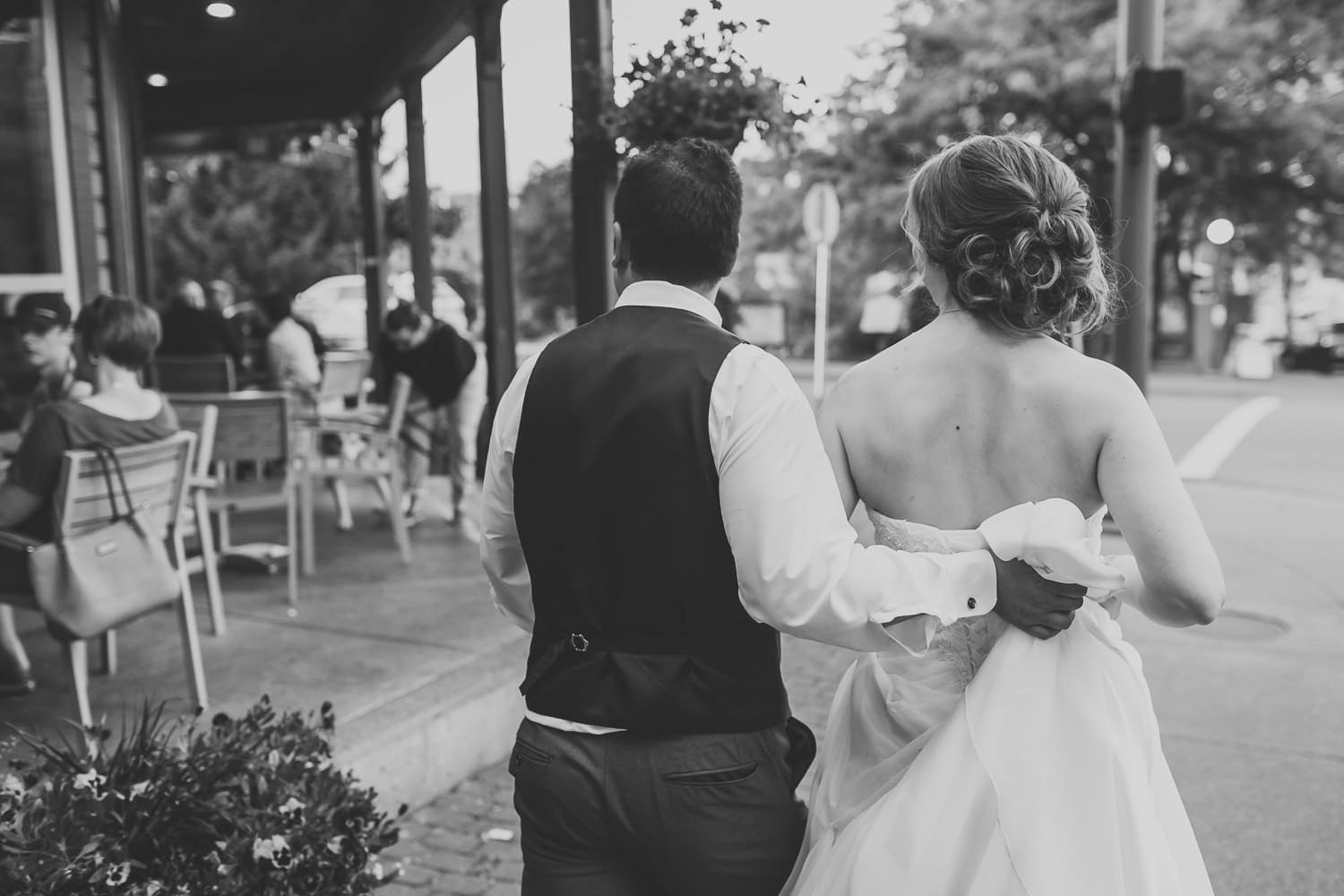 wedding couple walking down the street in fort langley