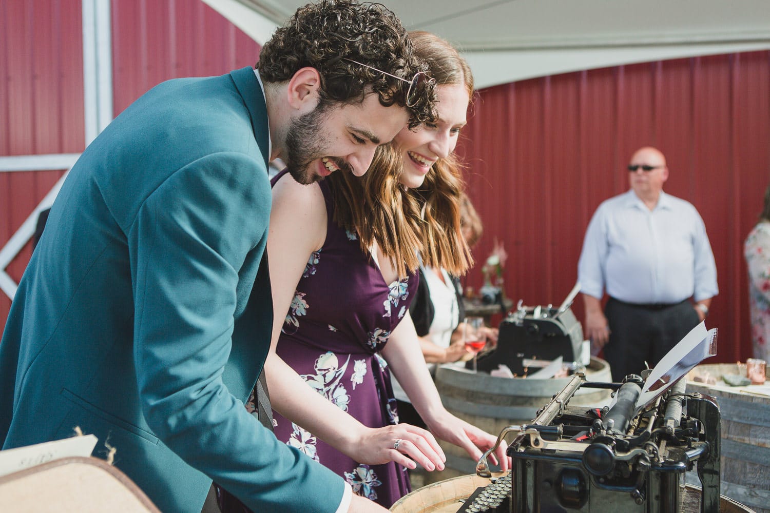 wedding cocktail hour with typewriter guestbook