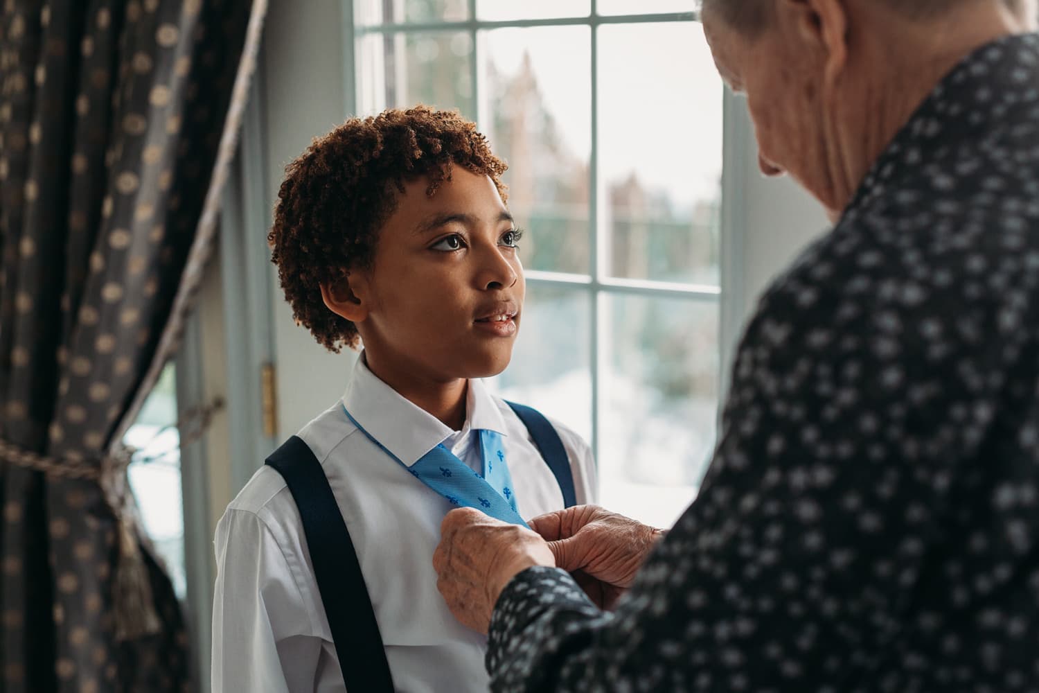 bipoc wedding in vancouver, son getting ready with grandfather