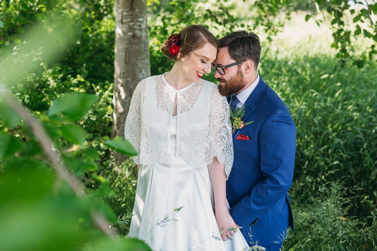 couples portraits on wedding day at blackie spit at Crescent Beach