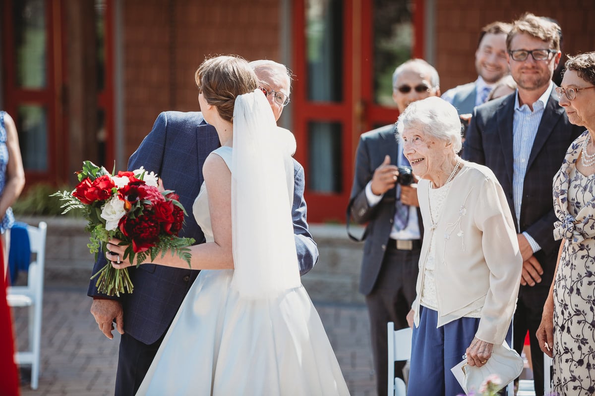 happy grandma at wedding ceremony
