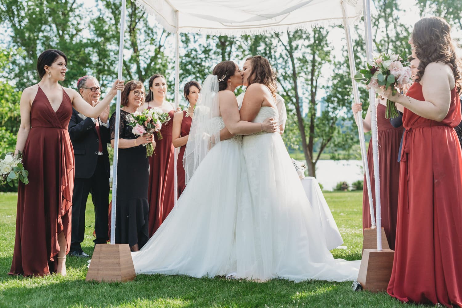 two brides first kiss at vancouver wedding ceremony