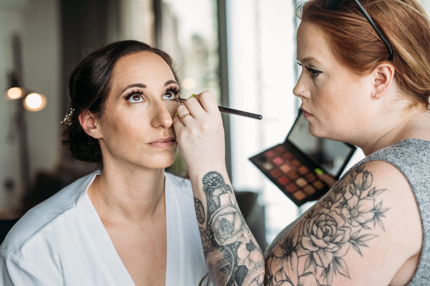 bride getting makeup done by Shayla of Rose Quartz Beauty in Vancouver