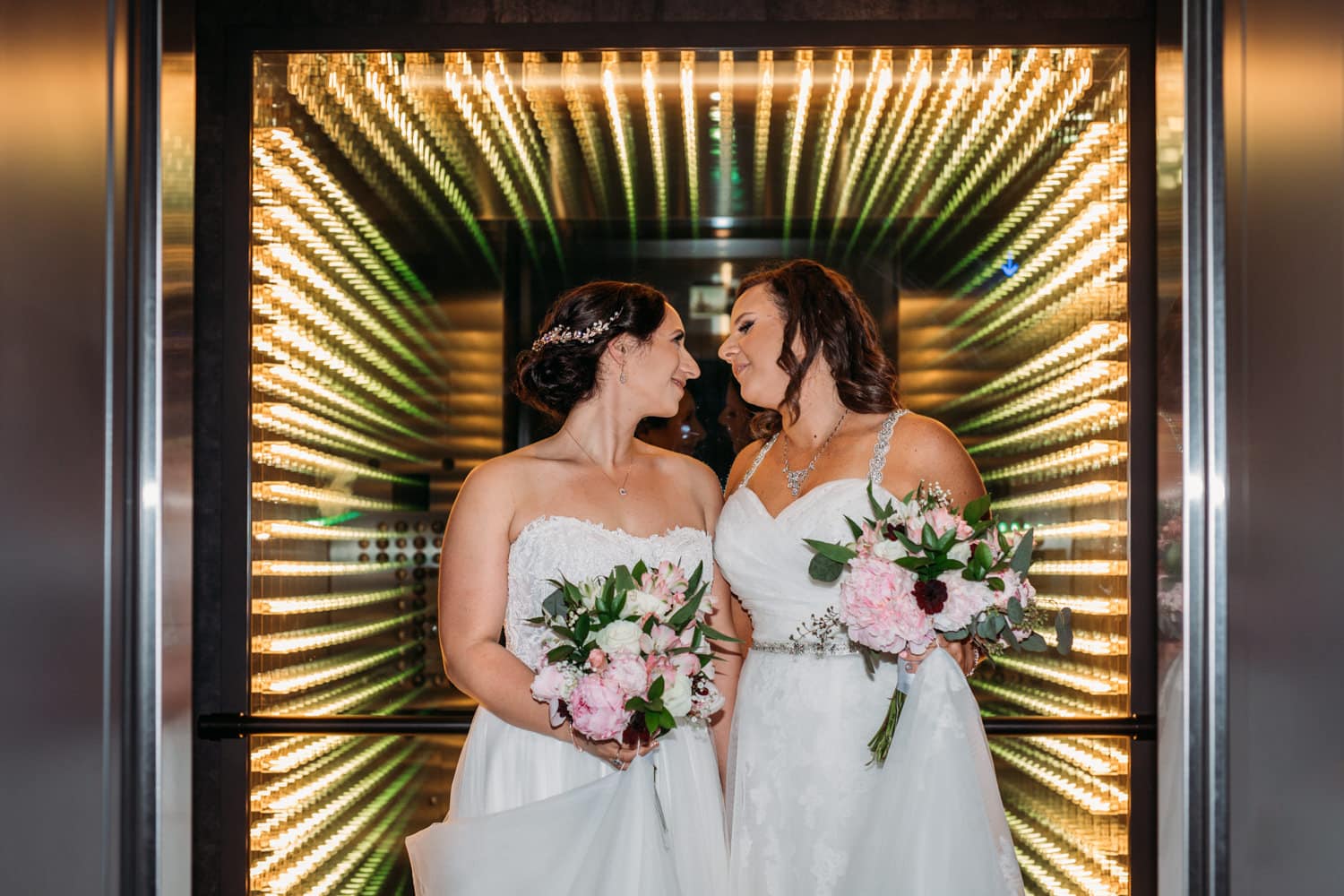 parq hotel wedding portait in elevator lgbtq wedding
